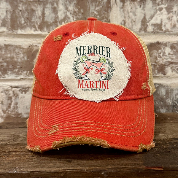 Merrier With a Martini hat by BohoGroove featuring a holiday martini design on a Red vintage distressed snapback trucker hat.