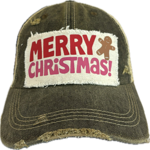 Merry Christmas Gingerbread hat by BohoGroove with red and pink Merry Christmas lettering and a gingerbread man graphic on a distressed off-white custom patch on a black vintage distressed snapback.