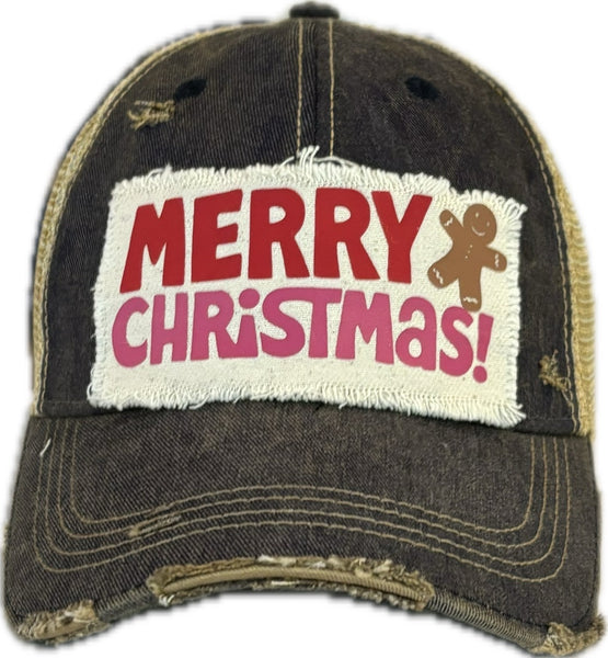 Merry Christmas Gingerbread hat by BohoGroove with red and pink Merry Christmas lettering and a gingerbread man graphic on a distressed off-white custom patch on a navy blue vintage distressed snapback.