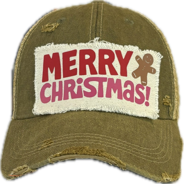Merry Christmas Gingerbread hat by BohoGroove with red and pink Merry Christmas lettering and a gingerbread man graphic on a distressed off-white custom patch on an olive vintage distressed snapback.