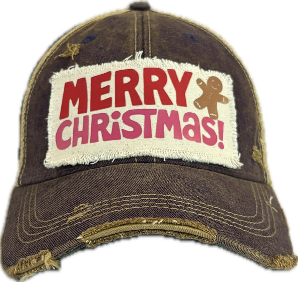 Merry Christmas Gingerbread hat by BohoGroove with red and pink Merry Christmas lettering and a gingerbread man graphic on a distressed off-white custom patch on a purple vintage distressed snapback.