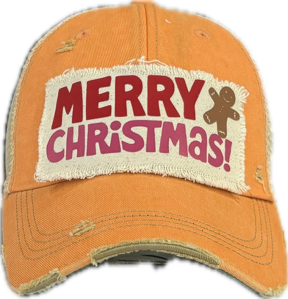 Merry Christmas Gingerbread hat by BohoGroove with red and pink Merry Christmas lettering and a gingerbread man graphic on a distressed off-white custom patch on a sherbet vintage distressed snapback.