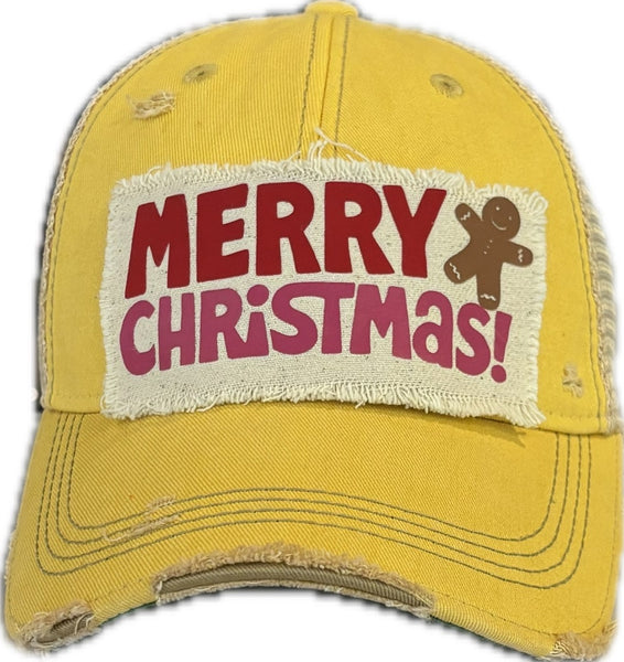 Merry Christmas Gingerbread hat by BohoGroove with red and pink Merry Christmas lettering and a gingerbread man graphic on a distressed off-white custom patch on a yellow vintage distressed snapback.