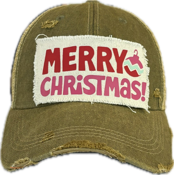 Merry Christmas Ornament hat by BohoGroove with red and pink Merry Christmas lettering and a pink ornament graphic on a distressed off-white custom patch on an olive vintage distressed snapback.
