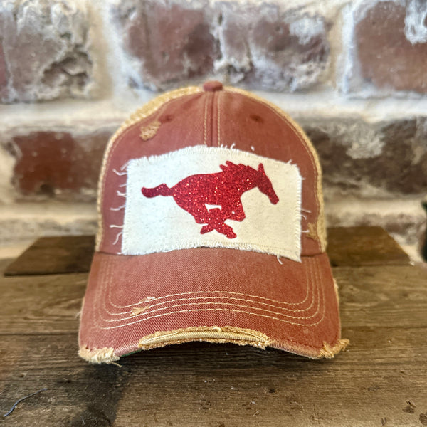 Mustang Pony Glitter Hat by BohoGroove with a red glitter running pony on a distressed off-white patch on a brick red vintage distressed snapback trucker hat.