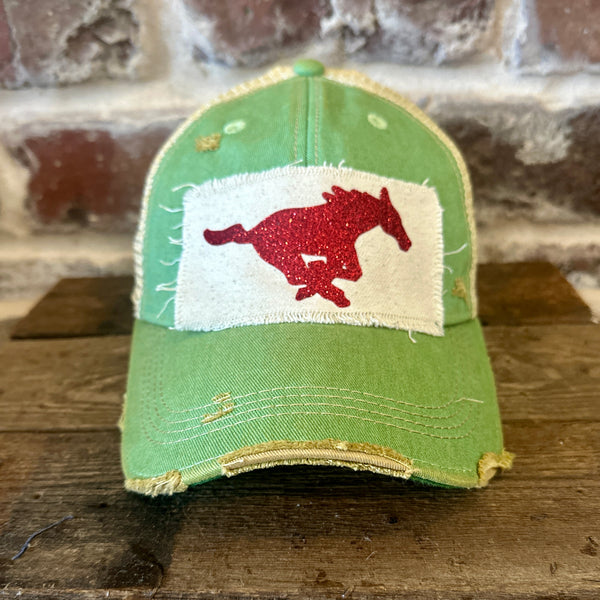 Mustang Pony Glitter Hat by BohoGroove with a red glitter running pony on a distressed off-white patch on a mint vintage distressed snapback trucker hat.