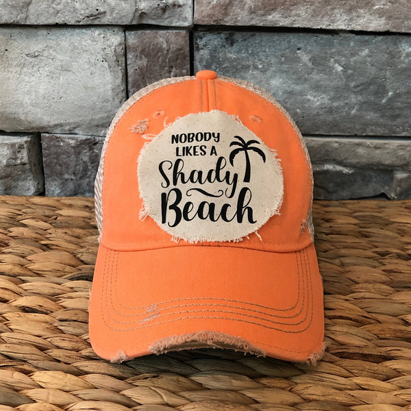 Nobody Likes a Shady Beach hat by BohoGroove featuring distressed off-white patch with black writing and palm tree graphic on a sherbet vintage distressed snapback