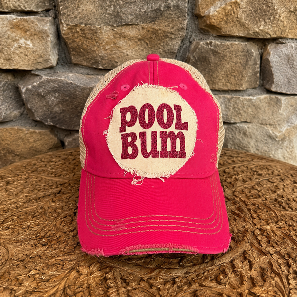 Pool Bum hat by BohoGroove featuring distressed off-white patch with pink glitter Pool Bum lettering on a pink vintage distressed snapback