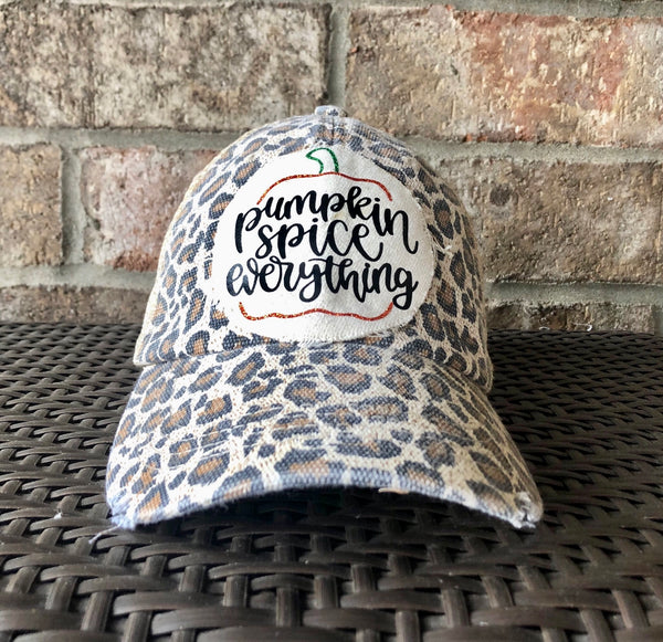 Pumpkin Spice Everything hat by BohoGroove with black Pumpkin Spice Everything lettering and pumpkin graphic on a distressed off-white patch on a leopard vintage distressed snapback.