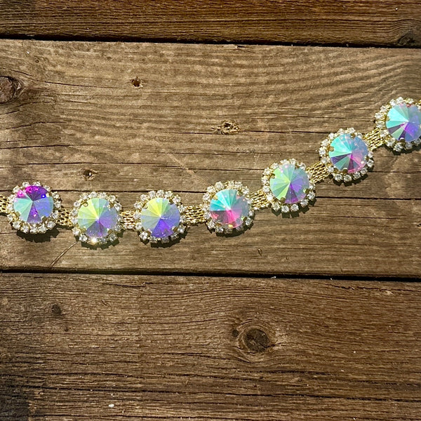 Rhinestone hat chain by BohoGroove, Disco Daze, featuring large iridescent rhinestones with clear rhinestone accents on a gold tone close up view.