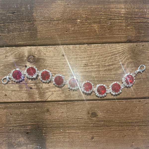 Rhinestone hat chain by BohoGroove, Ruby Slipper, featuring large red round rhinestones with clear rhinestone accents on a silver tone chain with loster clasp.