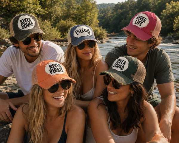 Group of men and women wearing BohoGroove river hats