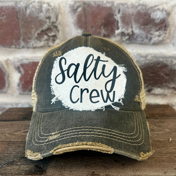 Salty Crew hat by BohoGroove with black Salty Crew lettering on a distressed off-white patch on a black vintage distressed snapback.