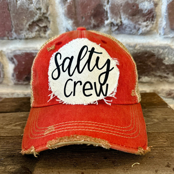 Salty Crew hat by BohoGroove with black Salty Crew lettering on distressed off-white patch on a red vintage distressed snapback.