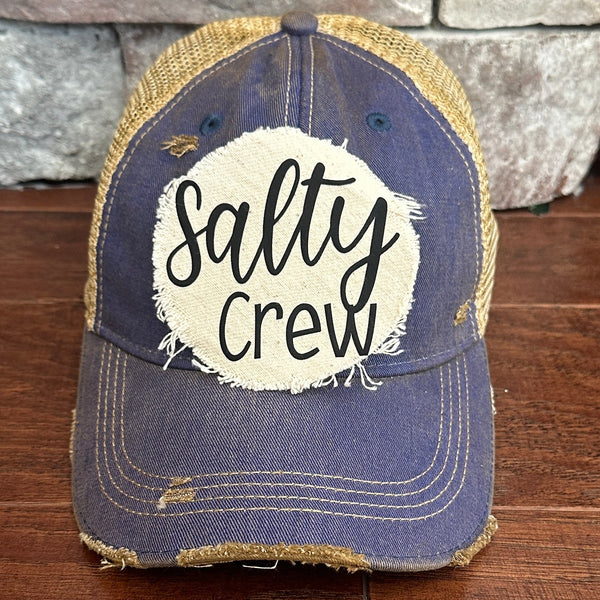 Salty Crew hat by BohoGroove with black Salty Crew lettering on distressed off-white patch on a royal blue vintage distressed snapback.
