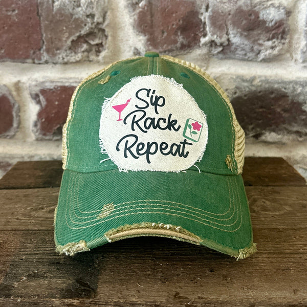 Sip, Rack, Repeat Mahjong hat by BohoGroove featuring black Sip, Rack, Repeat lettering with Mahjong tile graphics and a pink martini glass on an off-white distressed patch on a green vintage distressed snapback trucker hat.