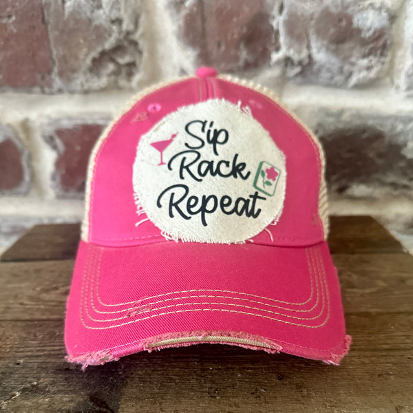 Sip, Rack, Repeat Mahjong hat by BohoGroove featuring black Sip, Rack, Repeat lettering with Mahjong tile graphic and a pink martini glass on an off-white distressed patch on a pink vintage distressed snapback trucker hat.