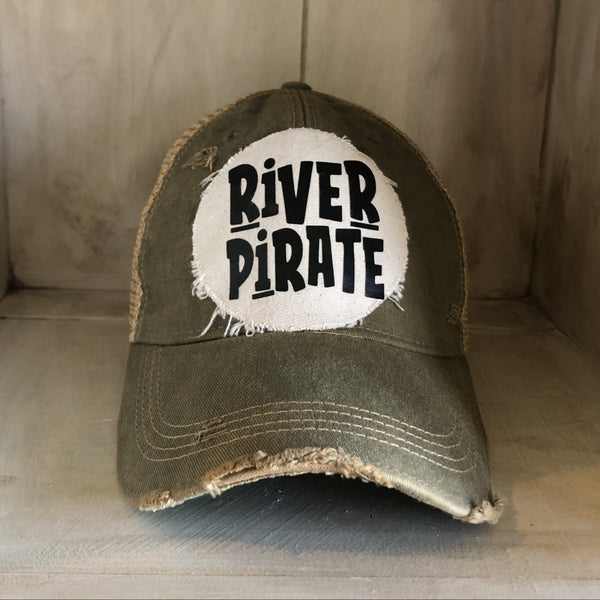 River Pirate hat by BohoGroove featuring distressed off-white patch with black River Pirate lettering on an olive vintage distressed snapback