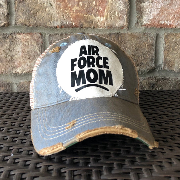 Air Force Mom hat by BohoGroove with black Air Force Mom lettering on a distressed off-white patch on a light blue vintage distressed snapback.