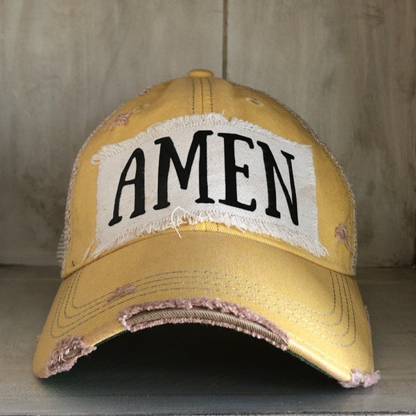 Amen hat by BohoGroove with black Amen lettering on distressed off-white patch on a yellow vintage distressed snapback.