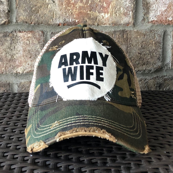 Army Wife hat by BohoGroove with black Army Wife lettering on a distressed off-white patch on a camo vintage distressed snapback.