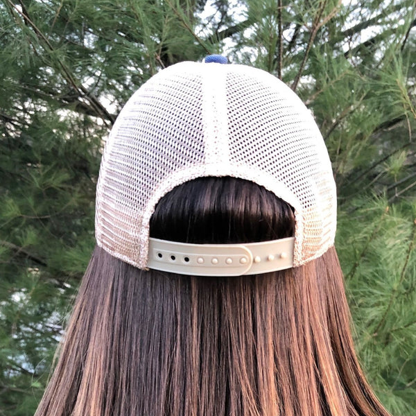 Back of BohoGroove distressed snapback on model