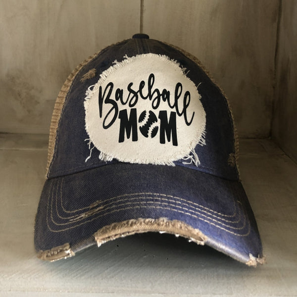 Baseball Mom hat by BohoGroove featuring black Baseball Mom lettering on a navy blue vintage distressed snapback hat