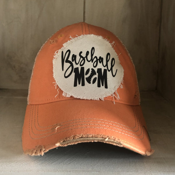 Baseball Mom hat by BohoGroove featuring black Baseball Mom lettering on a sherbet vintage distressed snapback hat