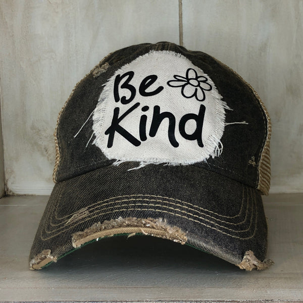 Be Kind hat by BohoGroove with black Be Kind lettering and flower graphic on distressed off-white patch on black vintage distressed snapback.