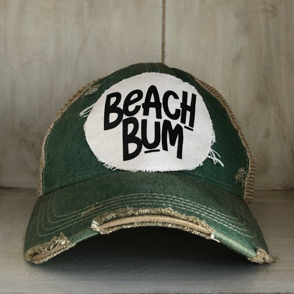 Beach Bum hat by BohoGroove featuring distressed off-white patch with black Beach Bum lettering on a green vintage distressed snapback