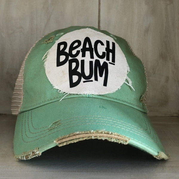 Beach Bum hat by BohoGroove with black Beach Bum lettering on distressed off-white patch on a mint green vintage distressed snapback.