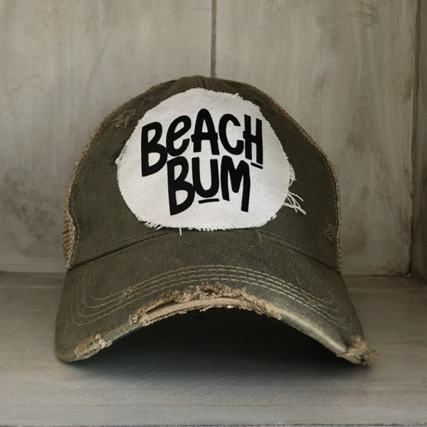Beach Bum hat by BohoGroove with black Beach Bum lettering on distressed off-white patch on a olive vintage distressed snapback.