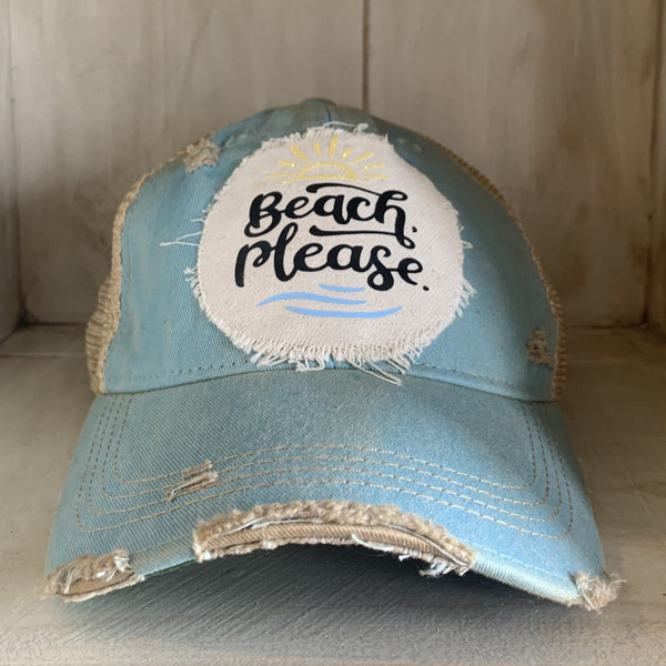 Beach Please hat by BohoGroove with black Beach Please lettering, yellow sun graphic, and blue wave graphic on distressed off-white patch on an ocean blue vintage distressed snapback.