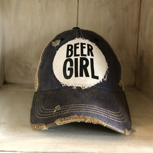 Beer Girl hat by BohoGroove with black Beer Girl lettering on a distressed off-white patch on a navy blue vintage distressed snapback trucker hat.