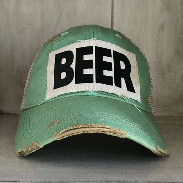 Beer hat by BohoGroove with black lettering on a distressed off-white custom patch on a mint vintage distressed snapback.