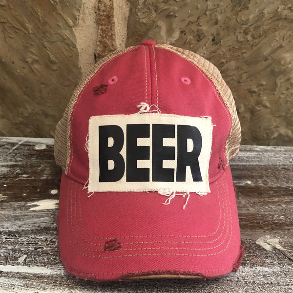 Beer hat by BohoGroove with black lettering on a distressed off-white custom patch on a pink vintage distressed snapback.