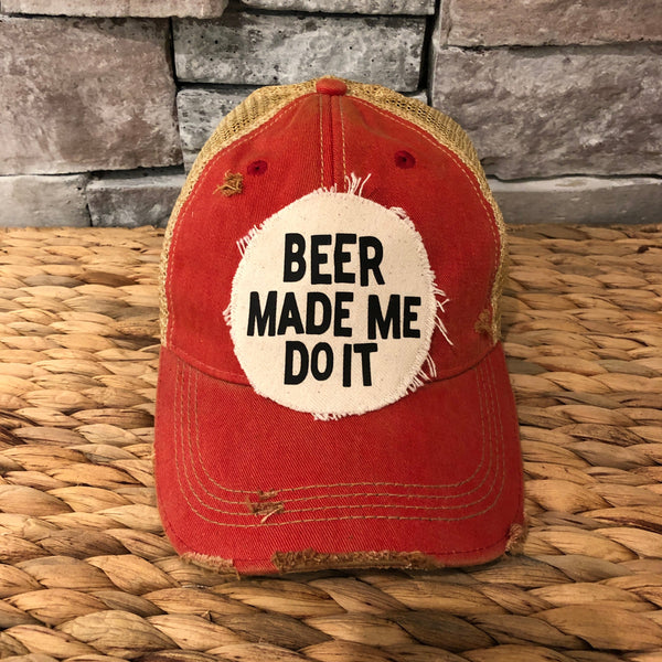 Beer Made Me Do It hat by BohoGroove featuring black Beer Made Me Do It lettering on a distressed off-white patch on a red vintage distressed snapback trucker hat.