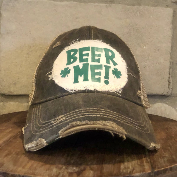 Beer Me hat by BohoGroove with green lettering and shamrock graphic on a distressed off-white custom patch on a black vintage distressed snapback.