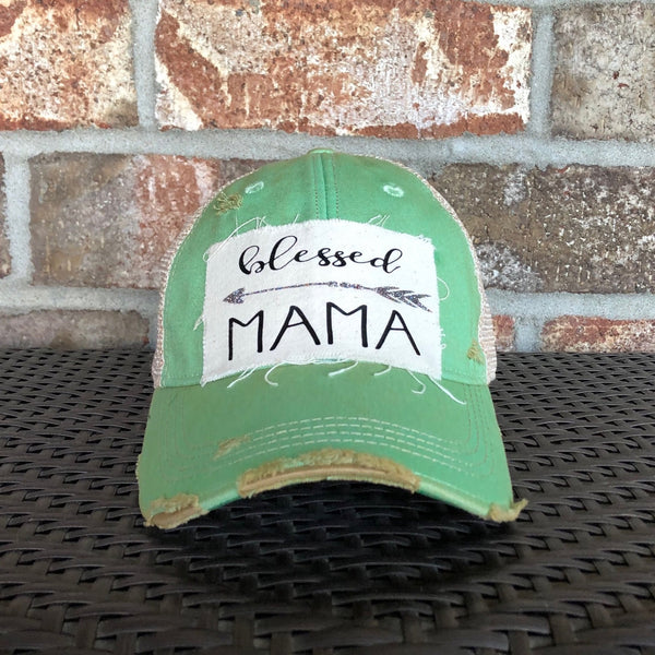 Blessed Mama hat by BohoGroove featuring black Blessed Mama lettering and arrow graphic on a mint vintage distressed snapback hat
