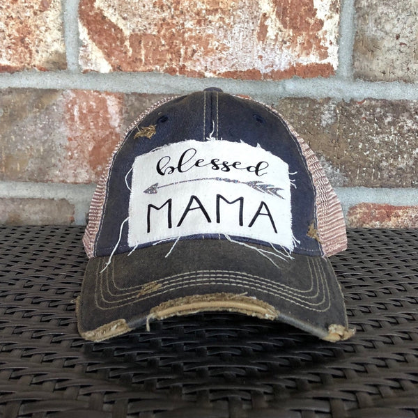 Blessed Mama hat by BohoGroove featuring black Blessed Mama lettering and arrow graphic on a navy blue vintage distressed snapback hat