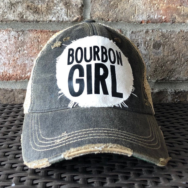 Bourbon Girl hat by BohoGroove with black lettering on a distressed off-white patch on a black vintage distressed snapback.