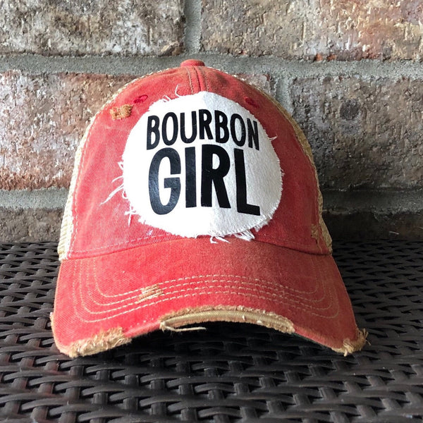Bourbon Girl hat by BohoGroove with black lettering on a distressed off-white patch on a red vintage distressed snapback.