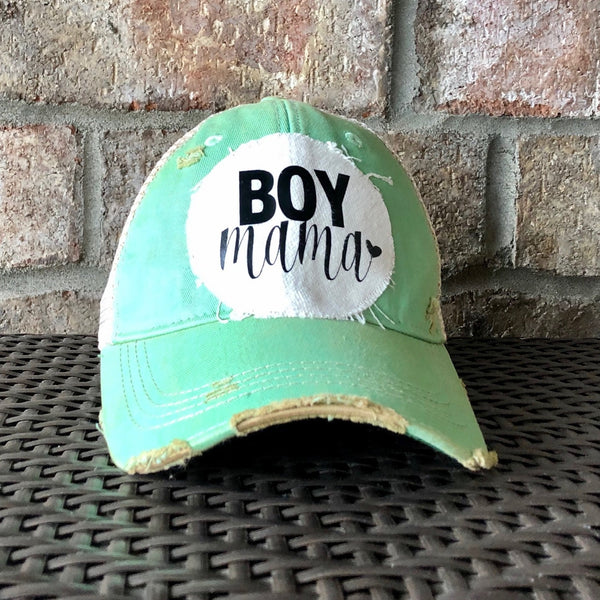 Boy Mama Hat by BohoGroove with black Boy Mama lettering and heart graphic on distressed off-white patch on a mint vintage distressed snapback