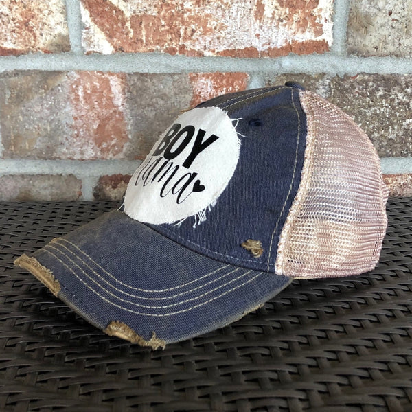 Boy Mama Hat by BohoGroove with black Boy Mama lettering and heart graphic on distressed off-white patch on a navy blue vintage distressed snapback right side 