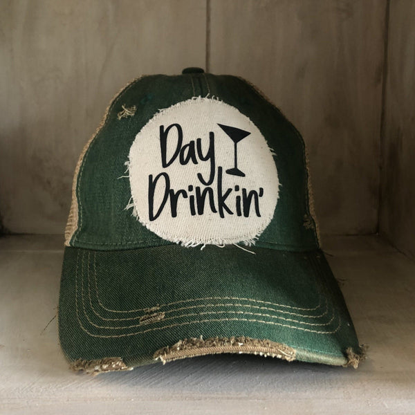 Day Drinkin hat by BohoGroove with black Day Drinkin lettering and martini glass graphic on distressed off-white patch on a green vintage distressed snapback.