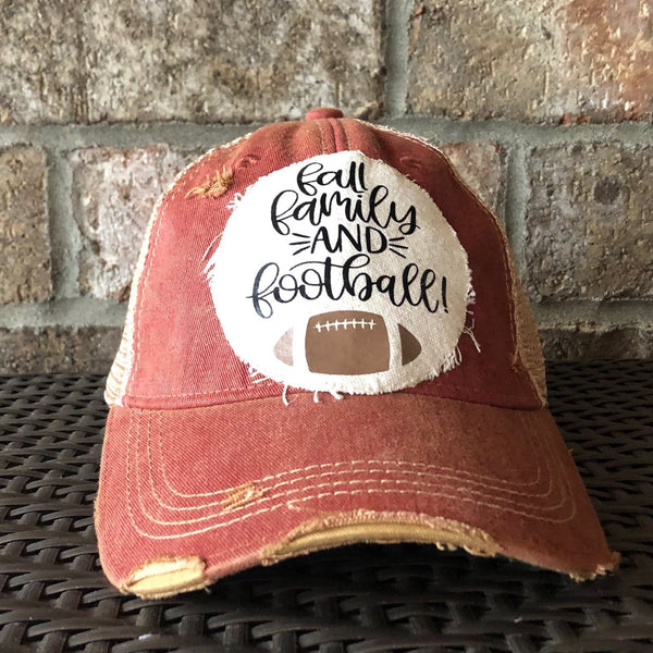 Fall Family and Football hat by BohoGroove with black Fall Family and Football lettering and football graphic on a cream patch on a brick red vintage distressed snapback.
