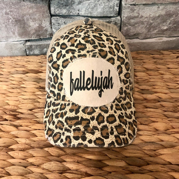 Fallelujah hat by BohoGroove with black fallelujah lettering on a cream patch on a leopard vintage distressed snapback.
