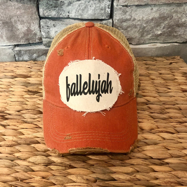 Fallelujah hat by BohoGroove with black fallelujah lettering on a cream patch on an orange vintage distressed snapback.