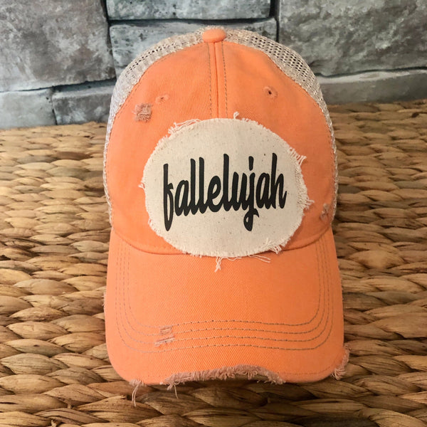 Fallelujah hat by BohoGroove with black fallelujah lettering on a cream patch on a sherbet vintage distressed snapback.