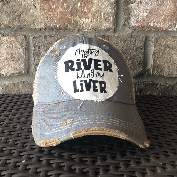 Floating the River Killing My Liver hat by BohoGroove featuring distressed off-white patch with black writing on a light blue vintage distressed snapback